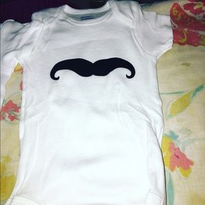 Mustache onesie