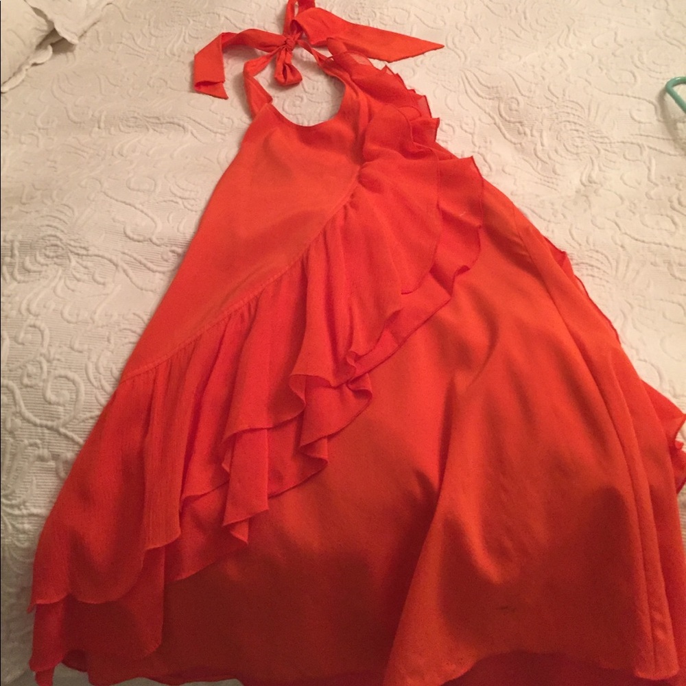 Orange cocktail dress.  Halter low open back