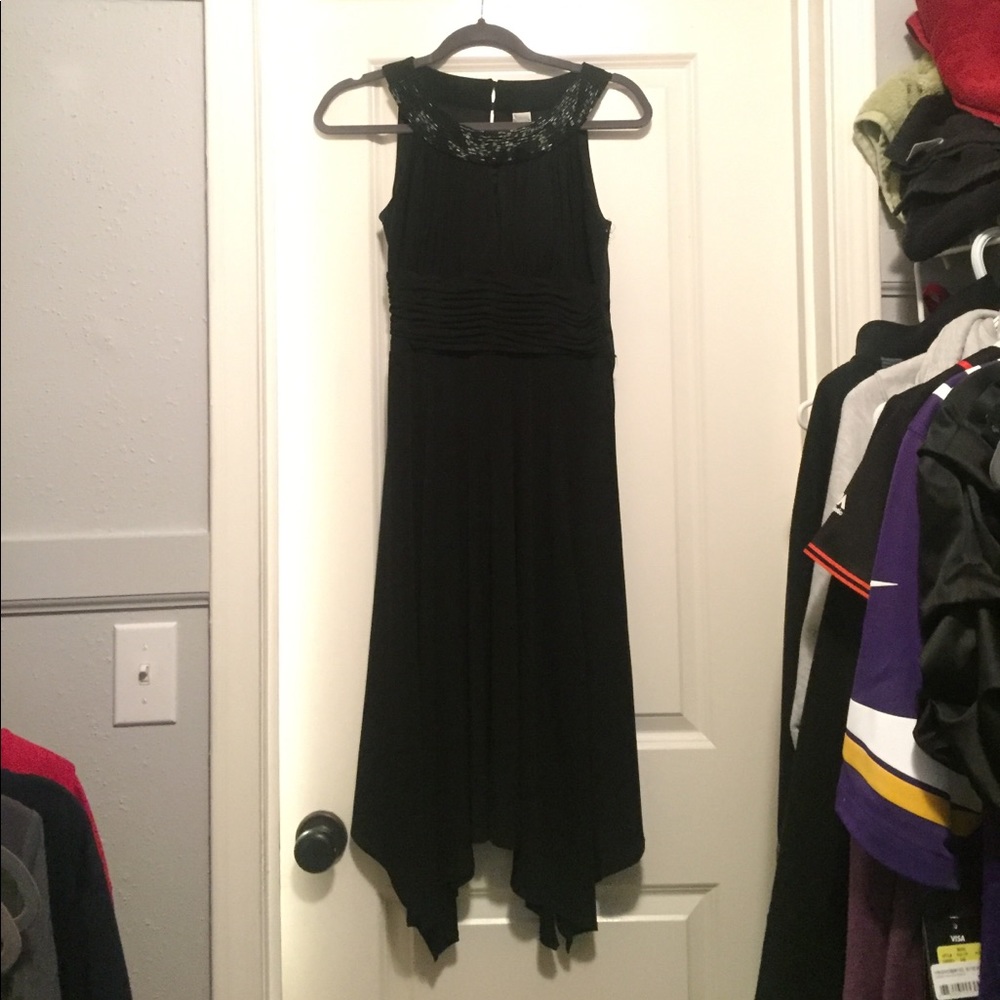 Asymmetrical hem black dress