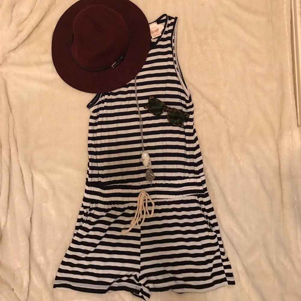 Navy and white striped romper with tie detail