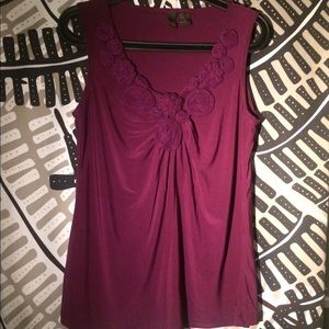 Pink tank with floral ornaments