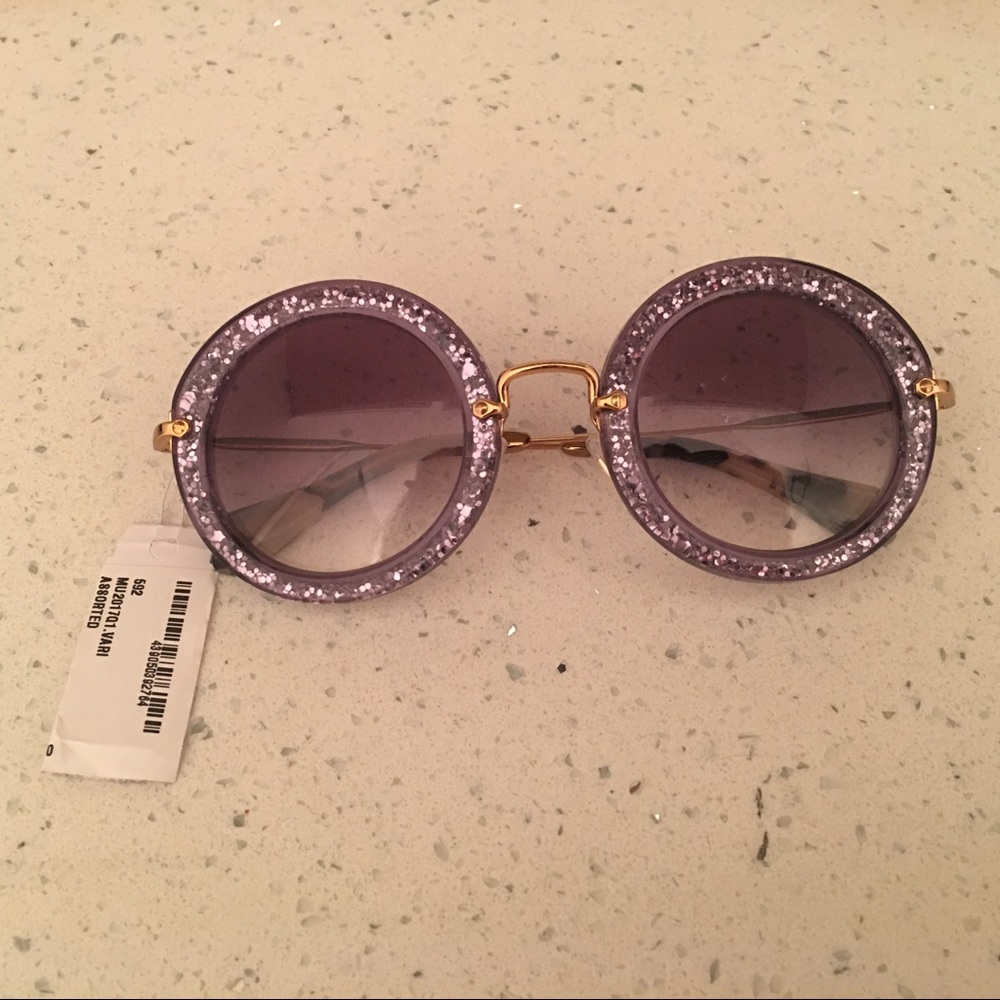 brand new miu miu sunglasses