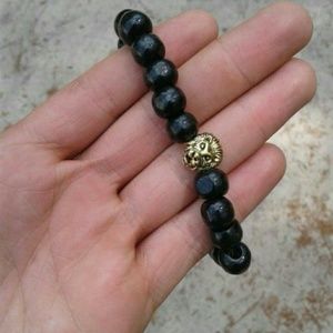 Bracelet with Lion head charm