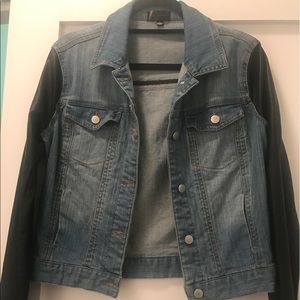 Jean jacket with leather sleeves