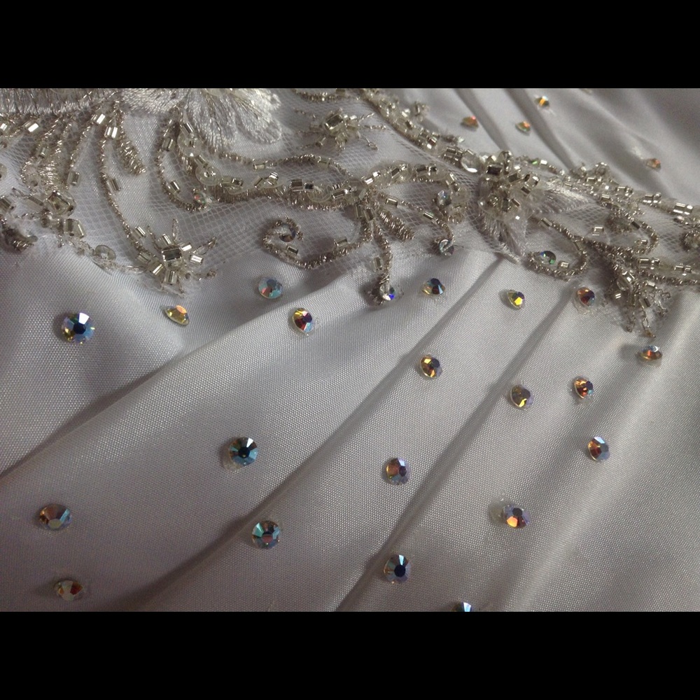 SATIN SWAROVSKI JEWELED TAILOR MADE WEDDING GOWN.