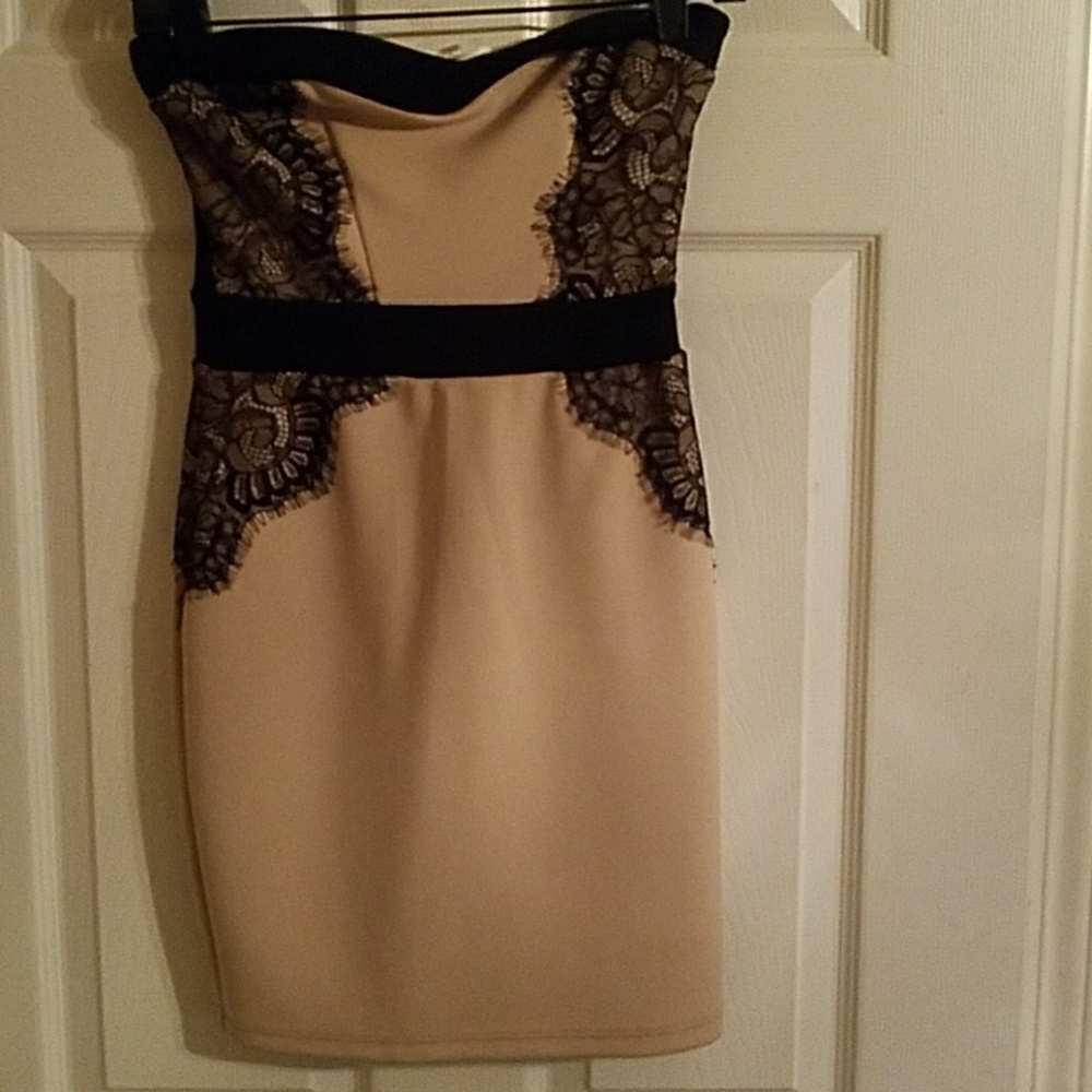 Brand new nude dress with mesh back and lace trim