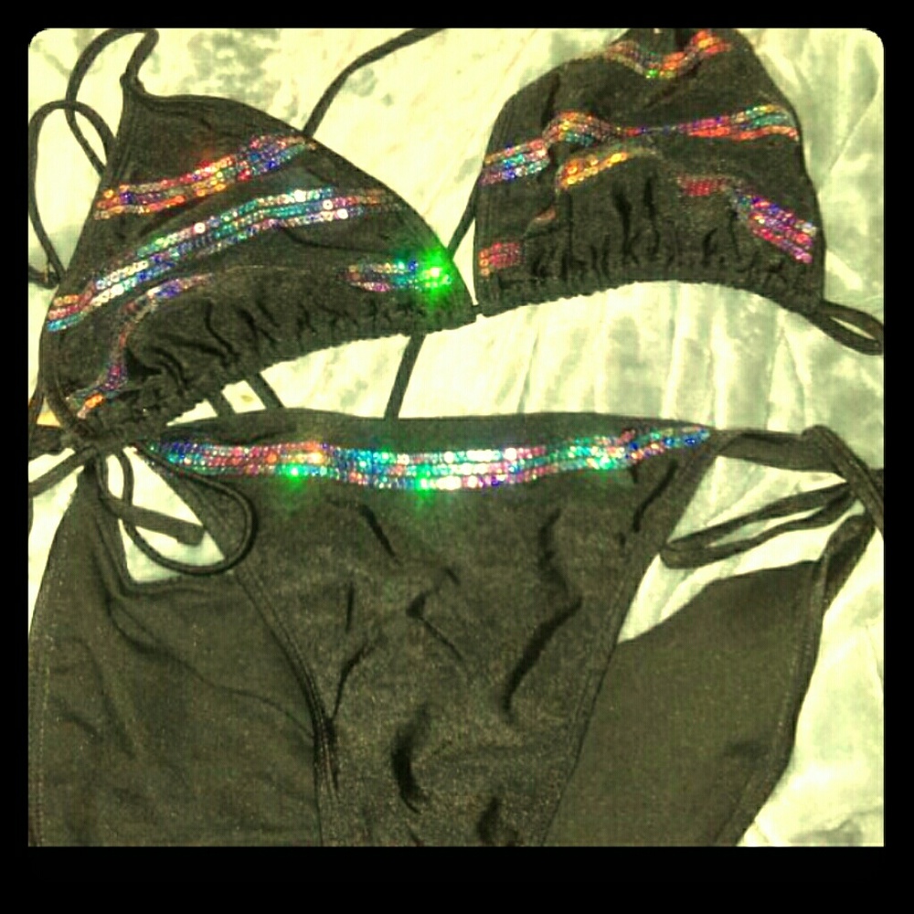 Black string bikini w iridescent sequins.