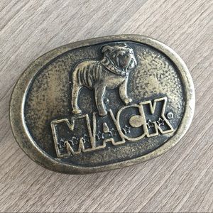 Antiqued brass belt buckle Mack truck logo