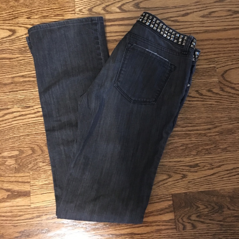 Black jeans with embellishment on waistband