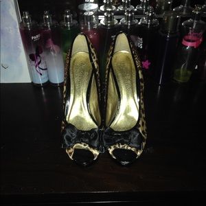 Cute cheetah heels with a black bow ❤ super cute!