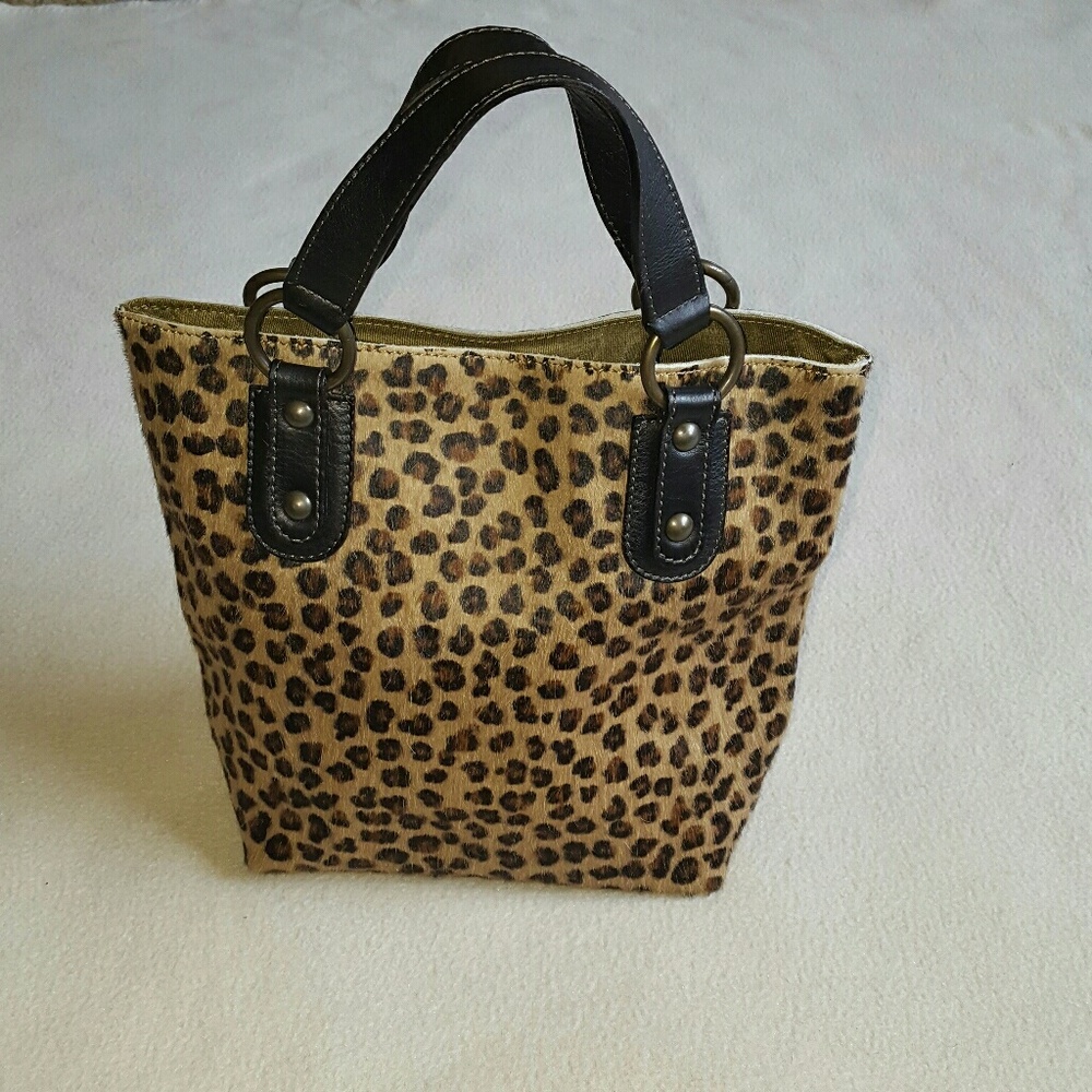 Maurizio Taiuti Leopard print, calf hair bag.