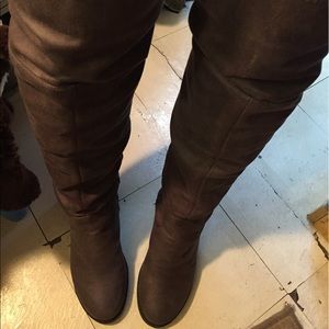 Over he knew suede boot. With chunky heel