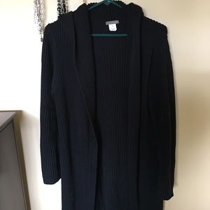 Black ribbed cardigan.  Falls about mid calf.