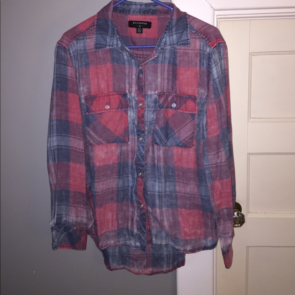 Gently used, purposefully worn in look button down