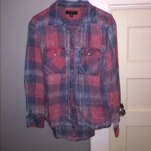Gently used, purposefully worn in look button down
