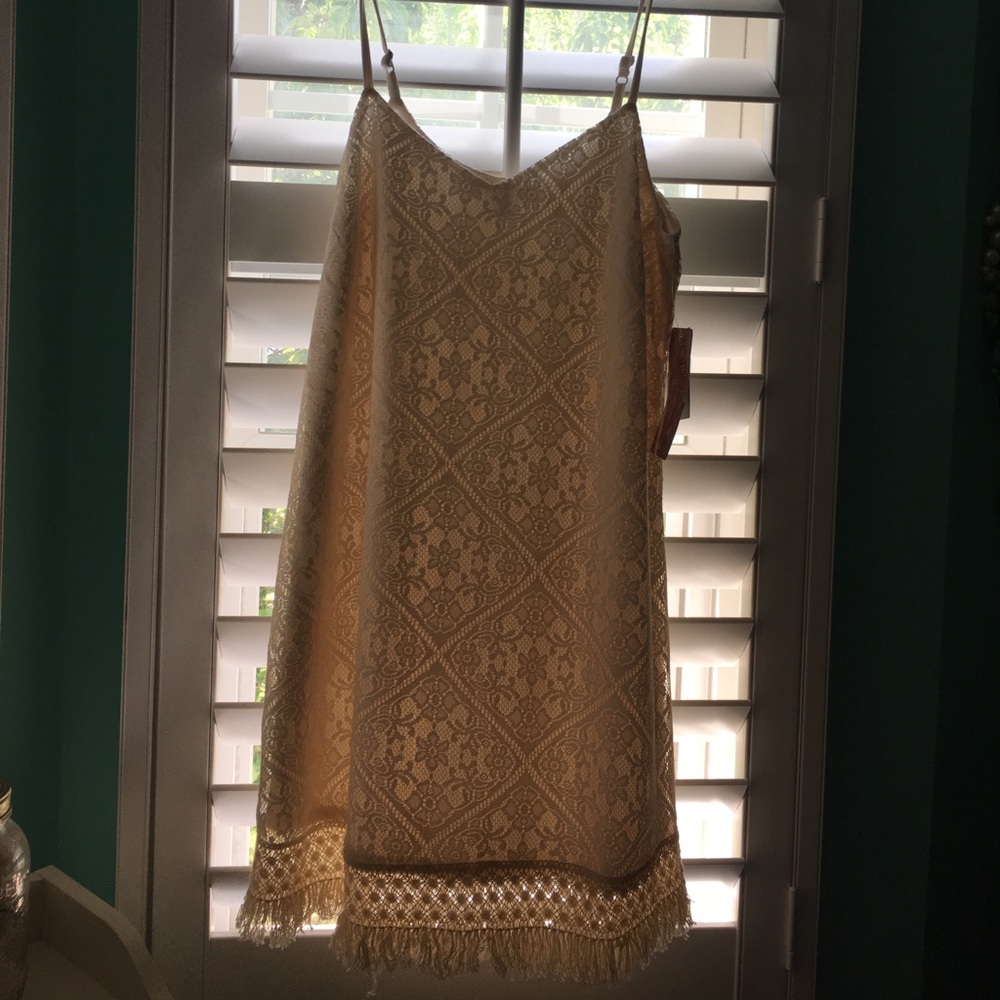 Brand new fringe hem dress