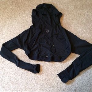 Hooded athleisure shrug by Sweaty Betty.