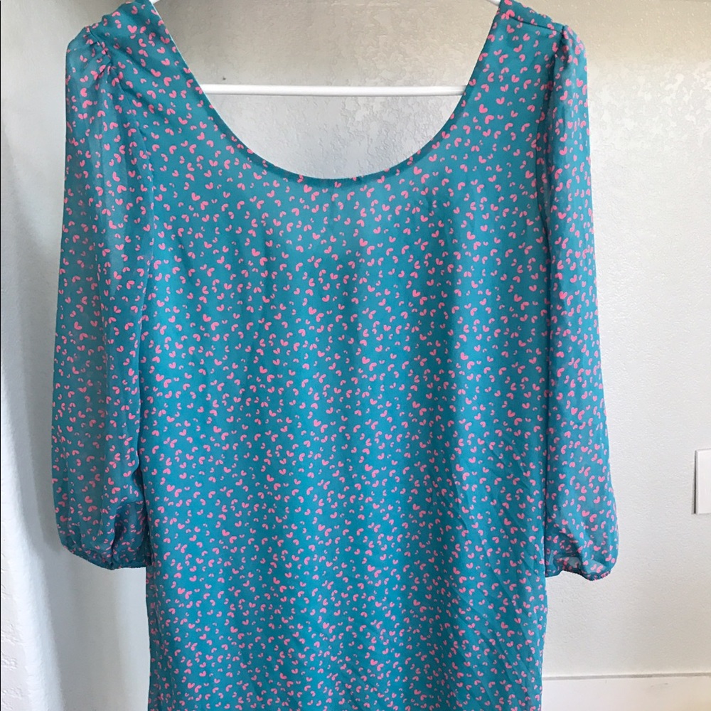 Diosa tunic with bow on back
