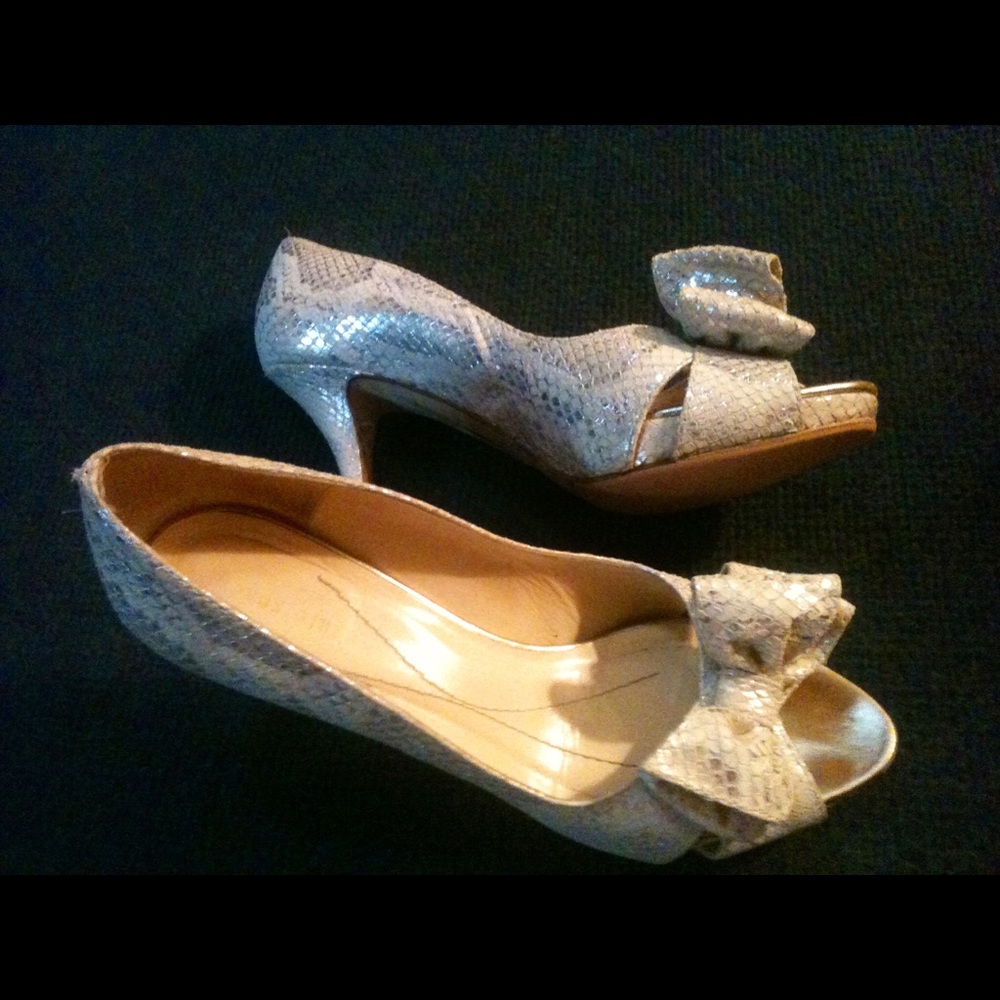 Like new. Kate spade pumps 9 heel new sole & heels