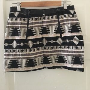 Tribal print skit with faux leather waistband