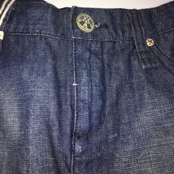 BCBGIrls Pleated Denim Distressed Eyelet Mini - Picture 5 of 8