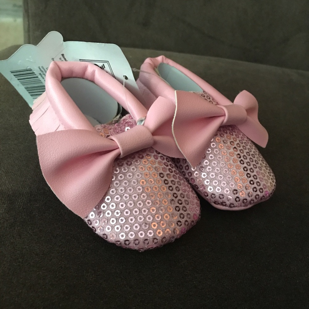 Pink moccasins for little girl