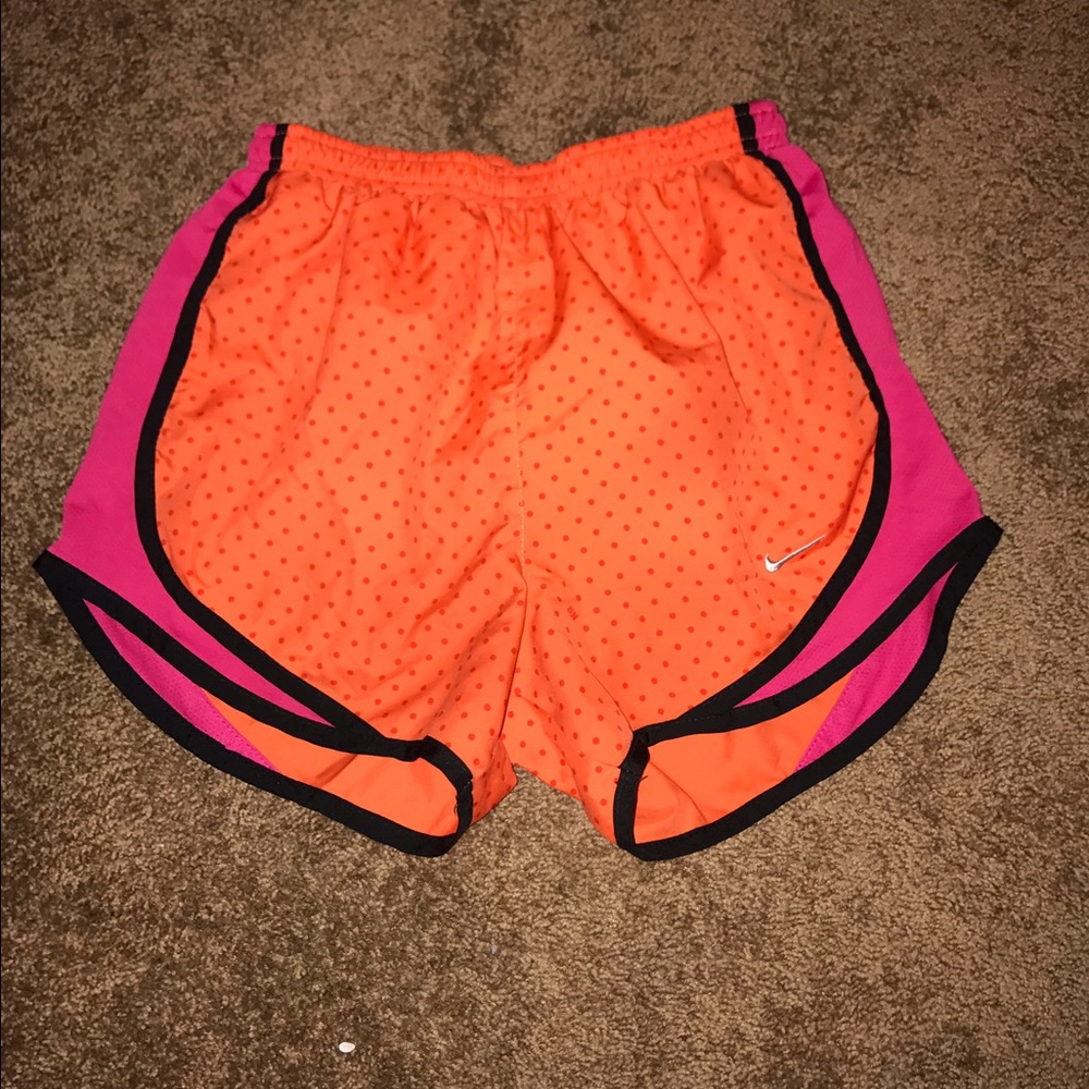 Pink and orange Nike shorts