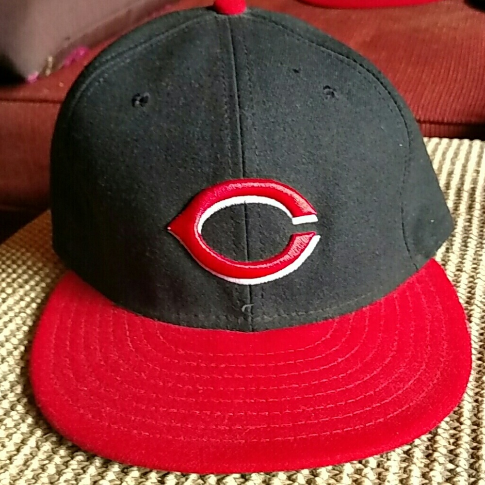 A red and black New Era Cubs fitted