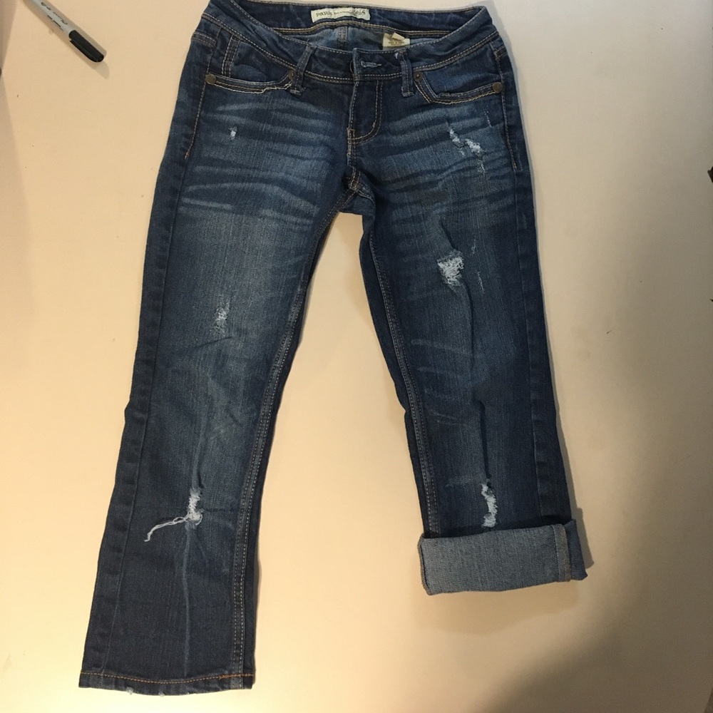 Distressed jeans capris
