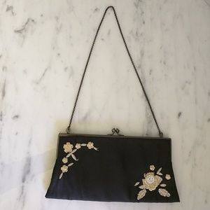 Black convertible clutch, ivory embroidery
