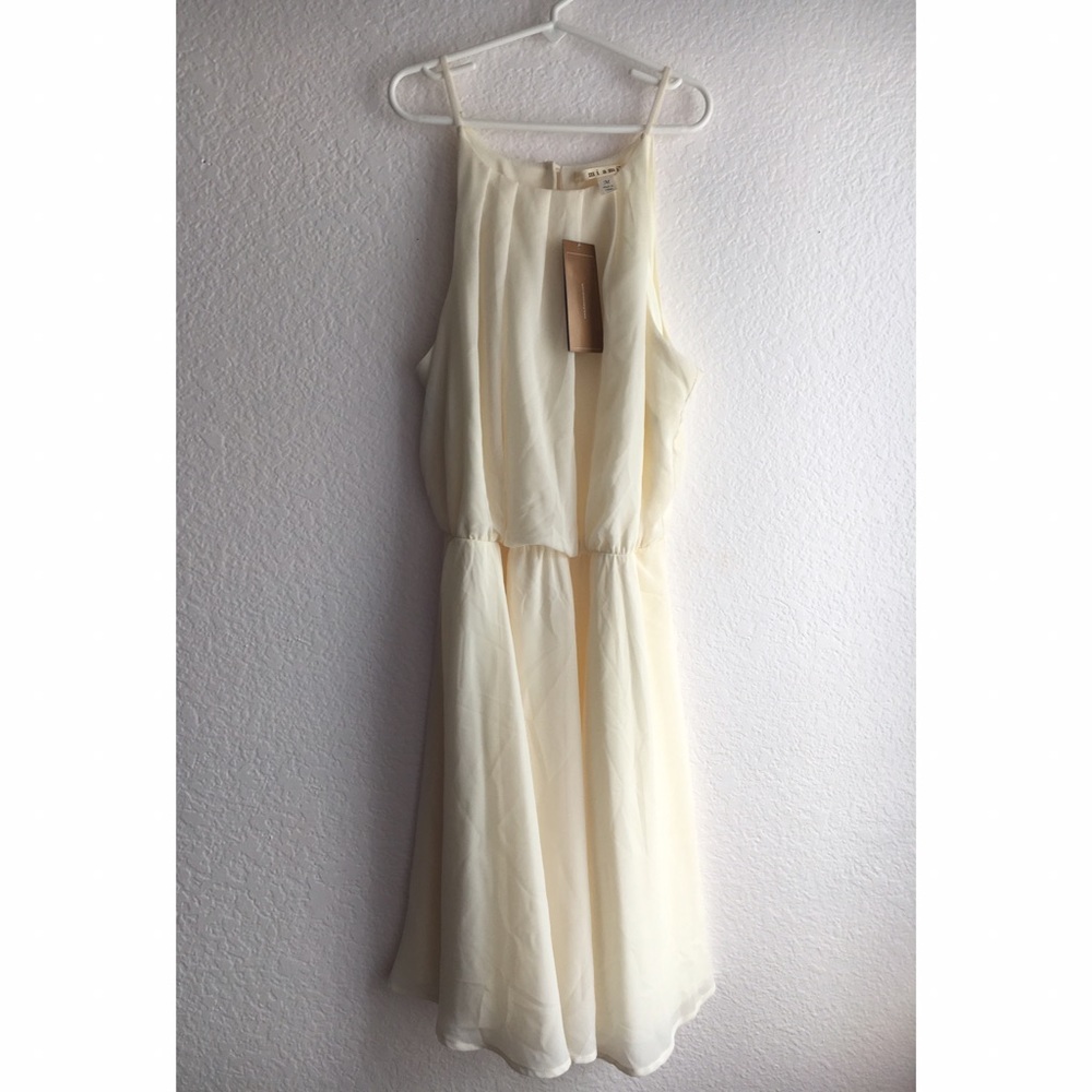 *****sold*******Ivory dress NWT