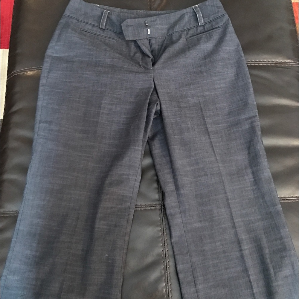 Dark gray dress pants.