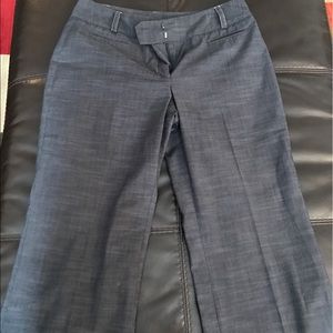 Dark gray dress pants.