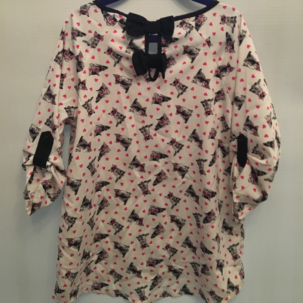 Kids summer blouse covered in kitty's and hearts.