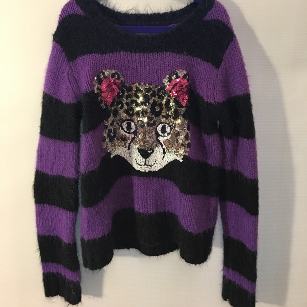 A Justice, Leopard print sweater.