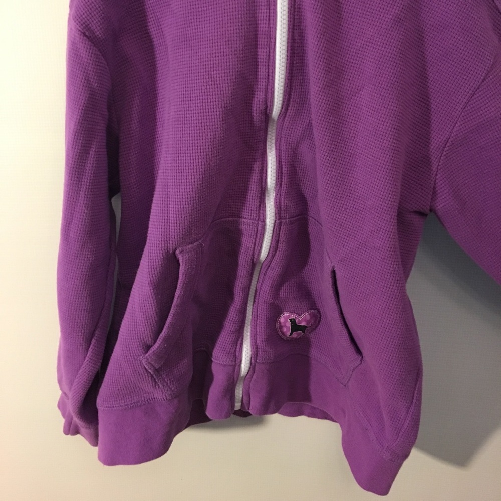 A Black Dog, purple cotton sweatshirt.