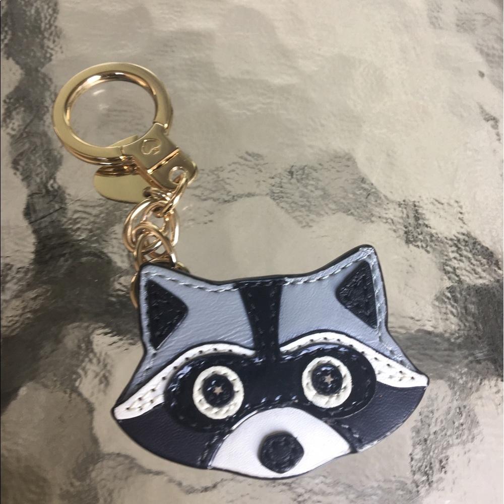 SOLD! ate Spade Raccoon Keychain