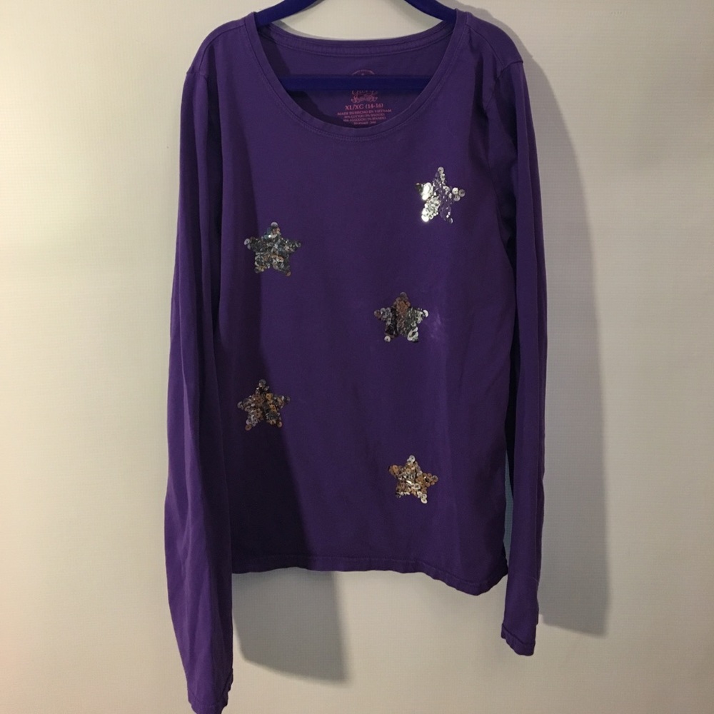 A long sleeve, purple winter shirt.