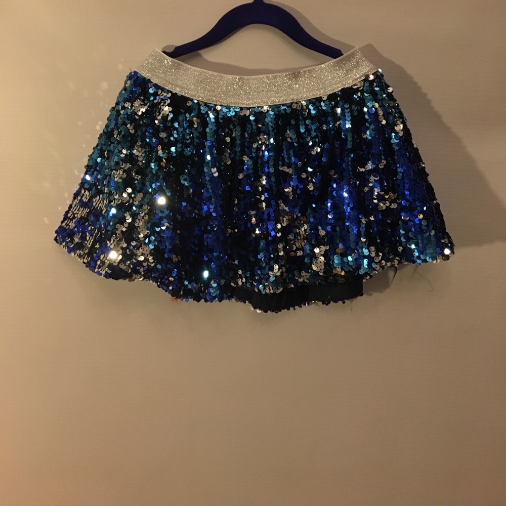 A blue sparkling skirt.