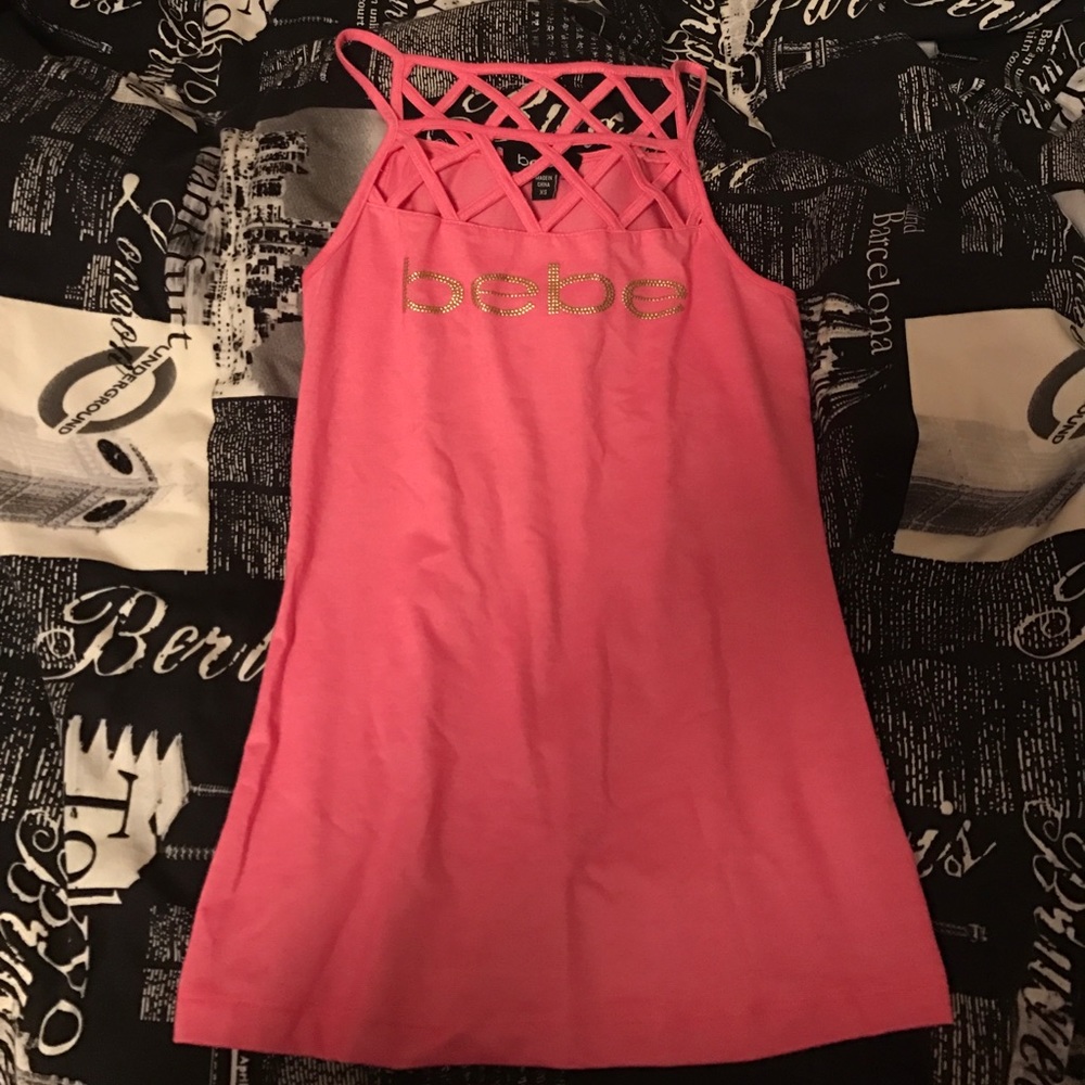 Never worn. Bebe crisscross neck tank top XS