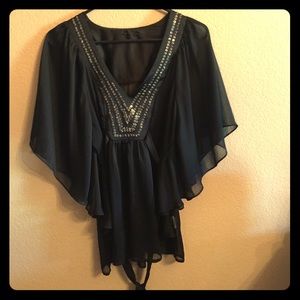 Shear black BEBE blouse