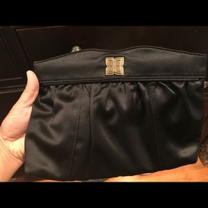BCBG black silk clutch.  Used once!