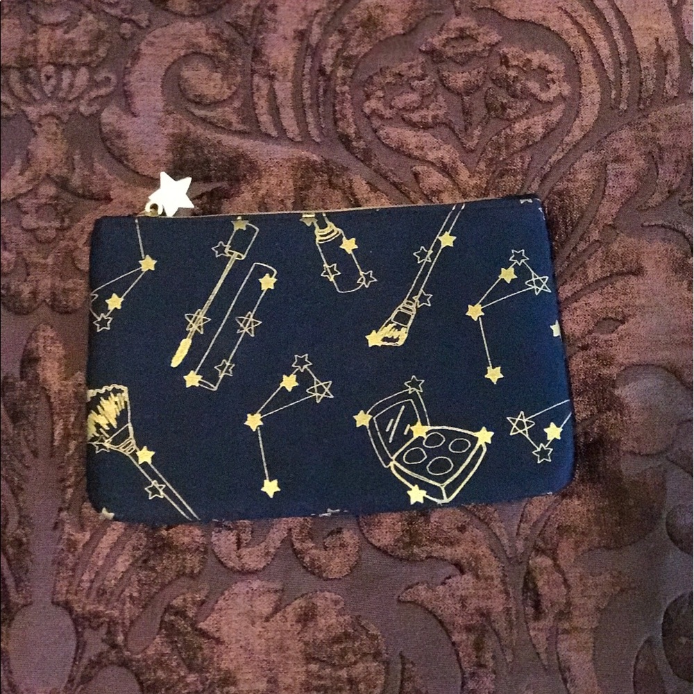 Gold constellations makeup bag