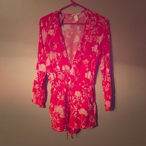 Long sleeve red H&M romper.