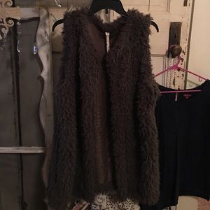 Uncle Frank brand furry vest. Grayish brown color