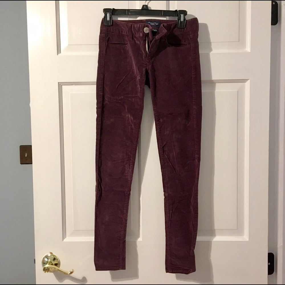 Deep burgundy wine corduroy skinny jeans.