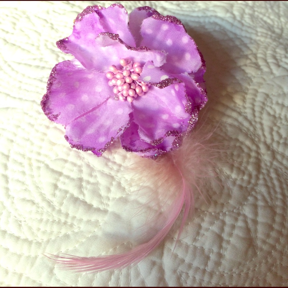 Purple flower clip with feather