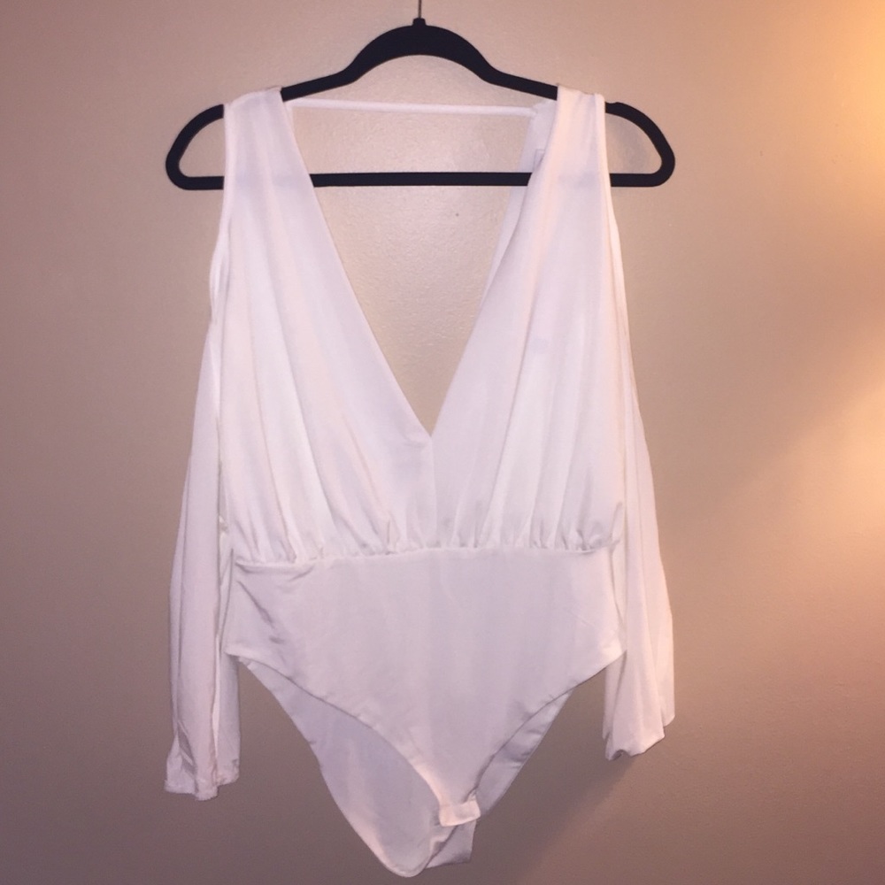 White body suit.