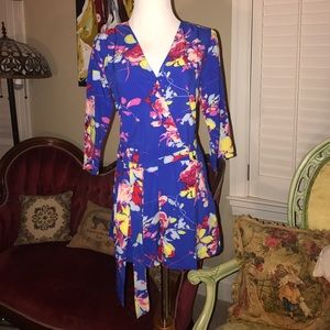 New blue floral silky romper.  Cute!