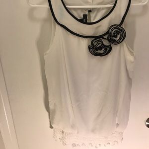 White and black sleeveless top